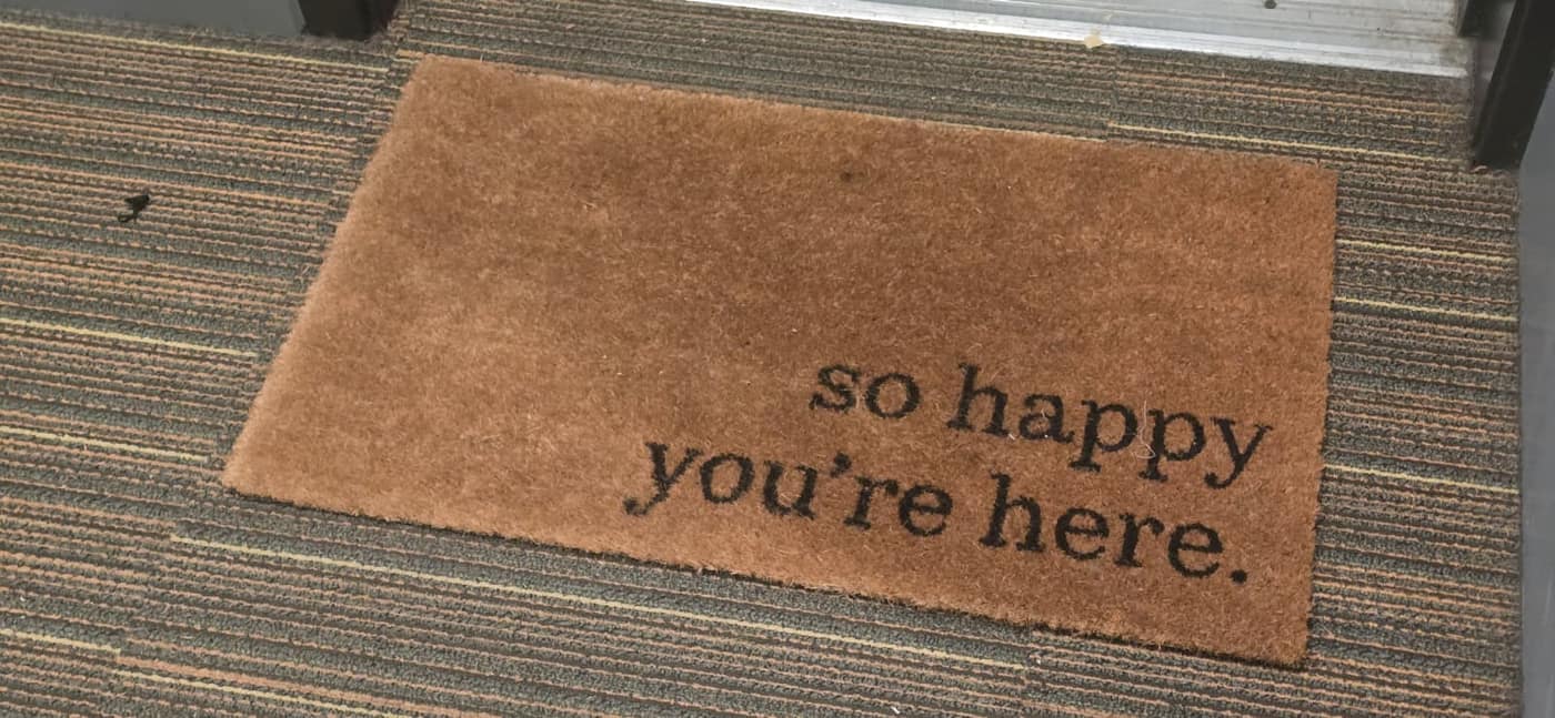 Coir "so happy you're here" doormat